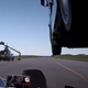 Illustration for article titled See How This Team Actually Jumped A Big Rig Over A Speeding F1 Car
